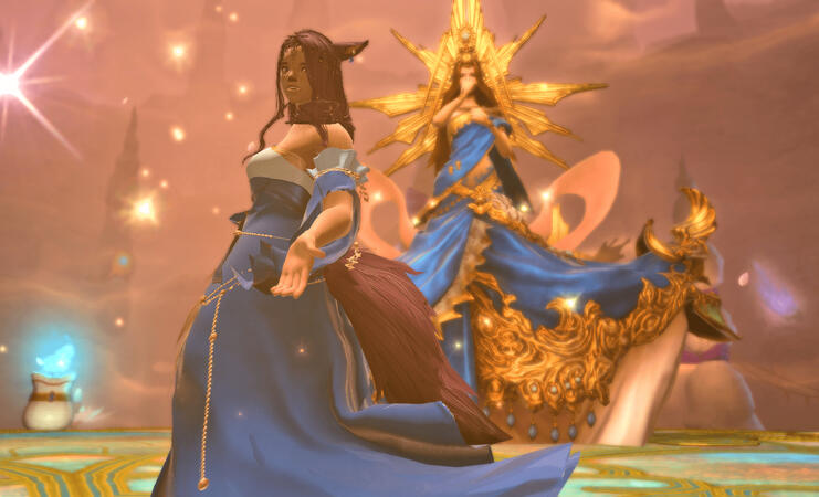 Lili'a is stood in front of the primal Lakshmi. She is wearing an elegant blue dress with gold accessories. Her hair is very long with a large side braid. She beckons to the viewer to join her. In the background, Lakshmi is laughing.