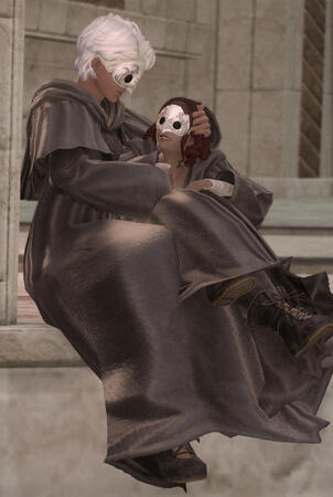 Two Ancients are sat on the outer ledge of the elevator that leads to Amarout. Ione, smaller, with red hair done up in curls, is sitting in the lap of Althea, who has white hair. They both have tawny skin. They appear happy. There is a film grain overlay.